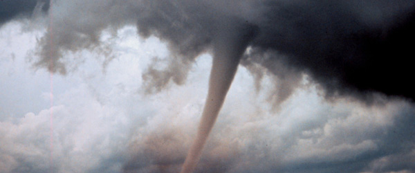 Funnel cloud in the evening sky.  Tornadoes can form in a moment’s notice, emphasizing the importance of being prepared.  Photograph from NOAA.