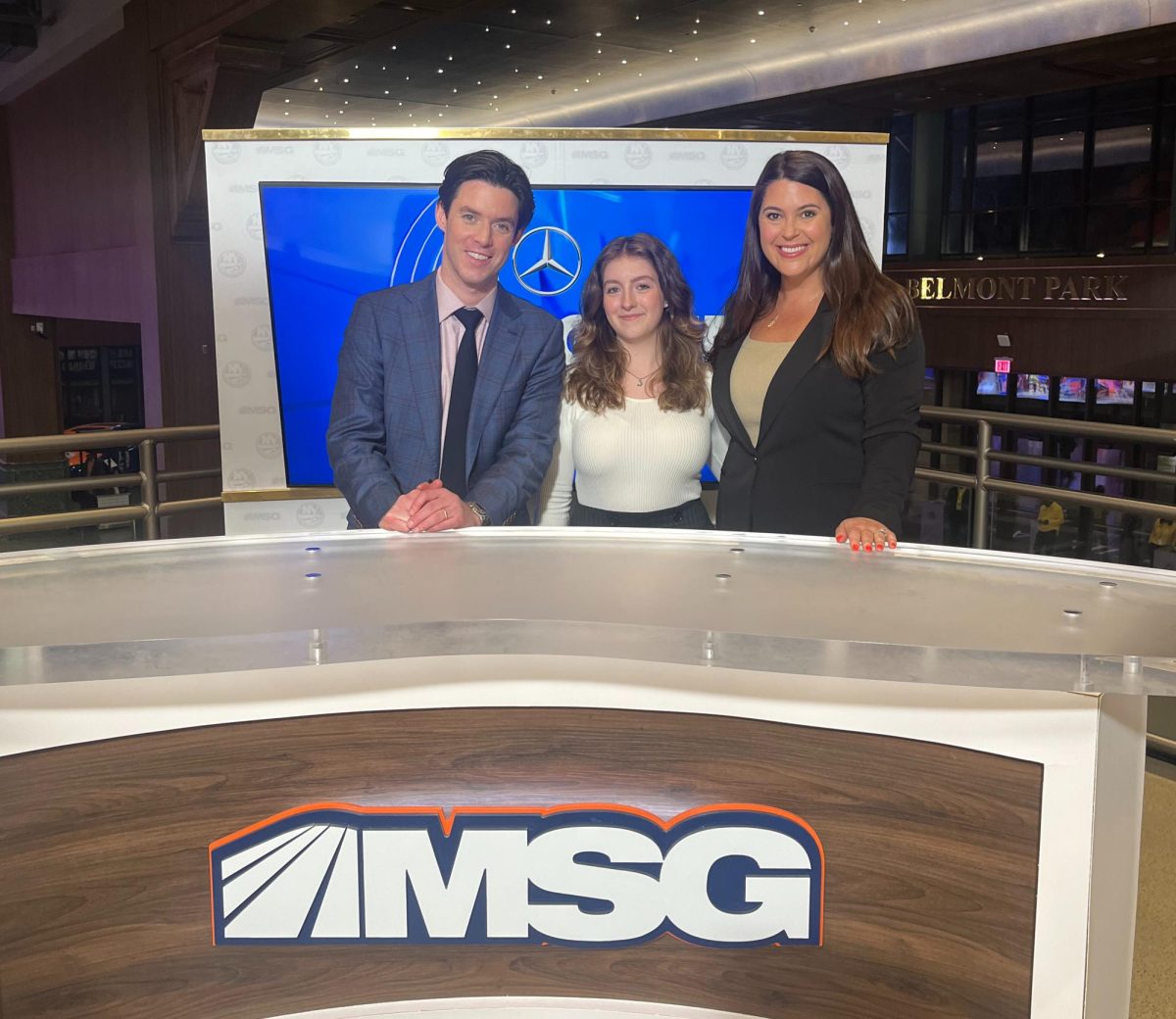Editor-in-Chief Michelle Smith poses on the Isles on MSG set with Shannon Hogan and Thomas Hickey
Photo courtesy of Michelle Smith